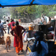 Image for article titled Her home was razed, but this Indian woman continues to care for 400 stray dogs